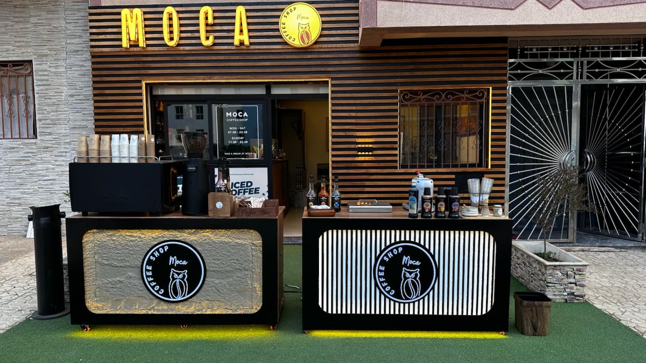 Coffee Moca event bar with evening lighting